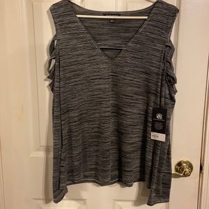 Woman’s shirt easy fir with cutout shoulder details